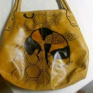 Reclaimed then handpainted bag